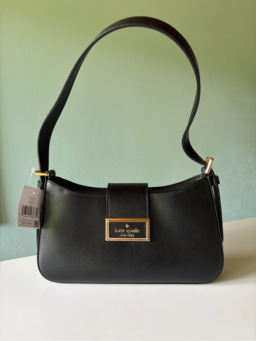 NWT Kate Spade Reegan Black Saffiano Leather Small Shoulder Bag.